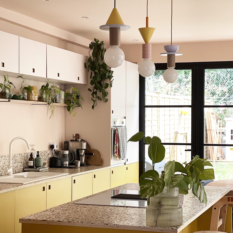 Plywood-Kitchen-with-Pink-and-Curry-Yellow-Laminate-doors